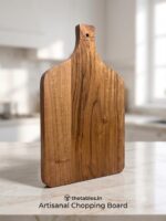 Handcrafted 13.5 by 9 inch wooden chopping board with handle by The Tables.